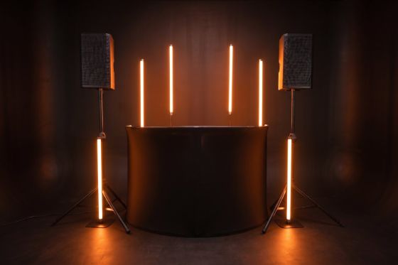 Nightbird Neon framing the DJ booth