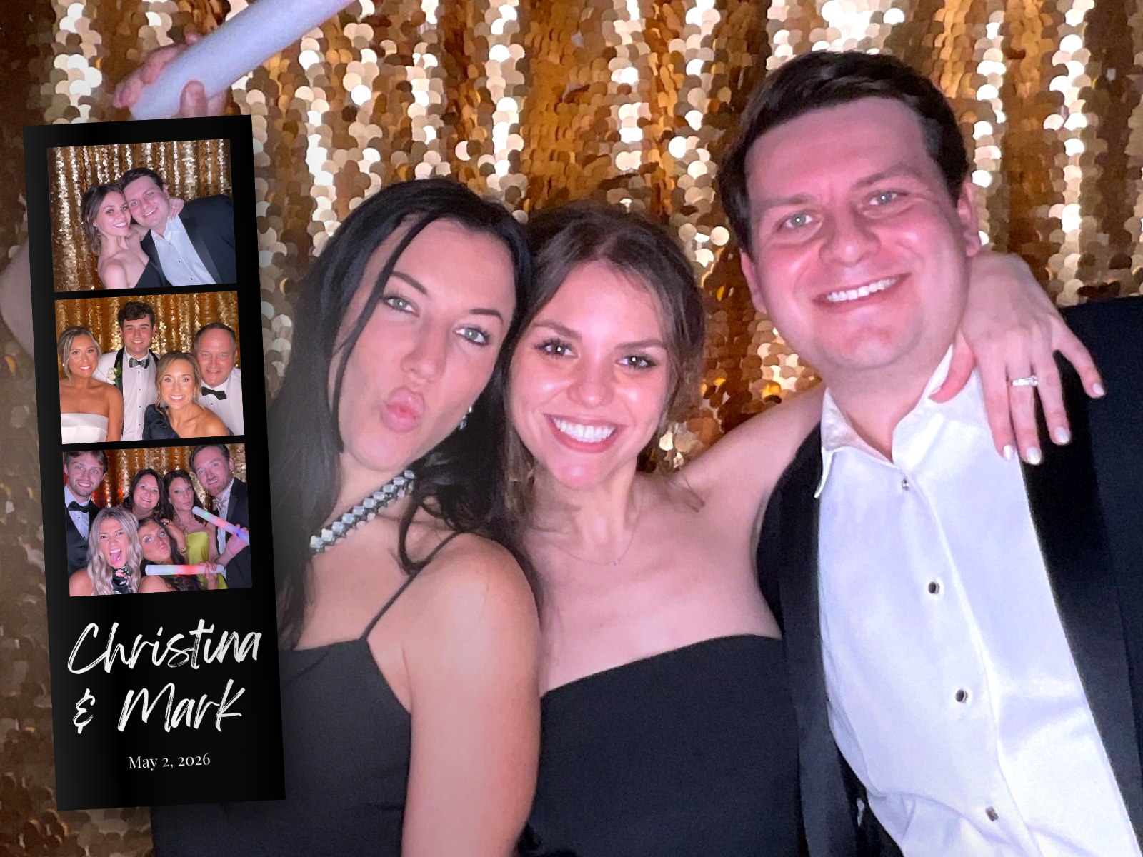 Wedding guests collecting an instant photo strip from the print booth