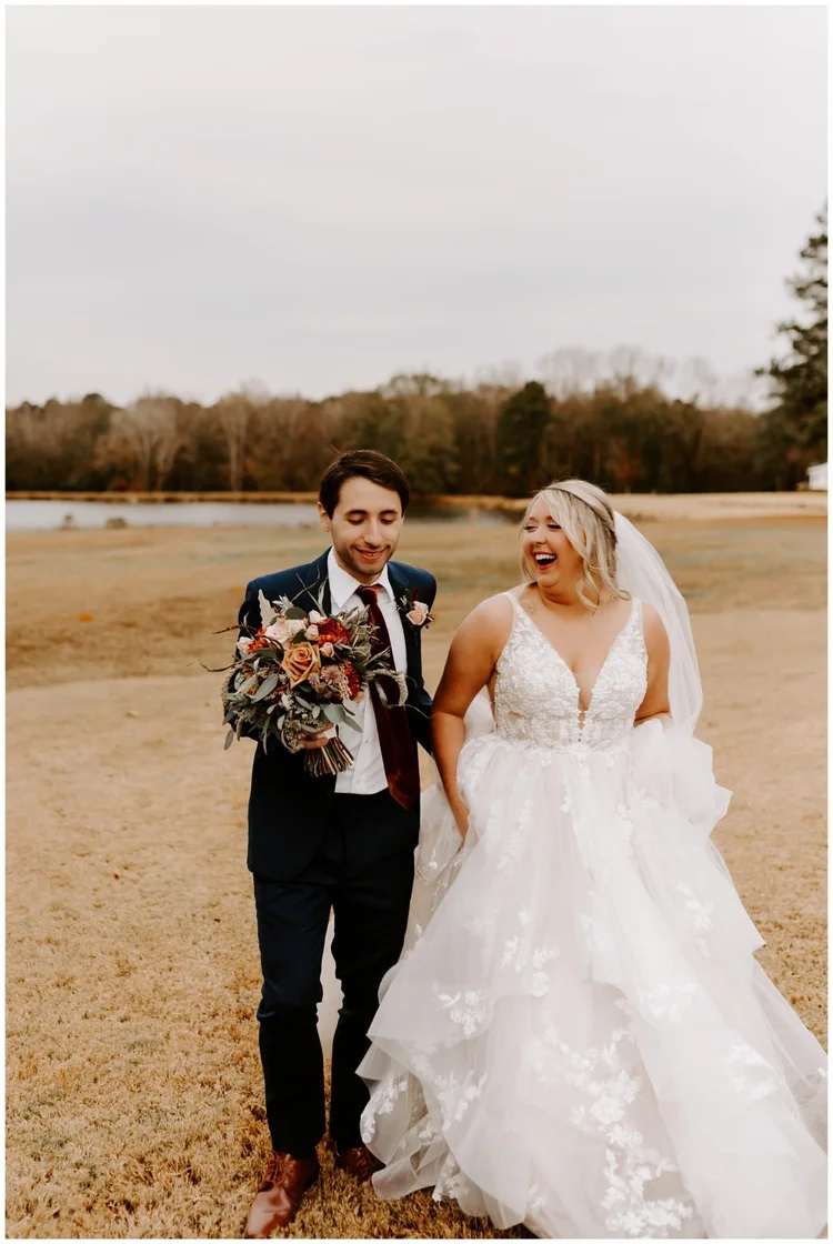 The white barn and pond at The 62, Madison, Georgia