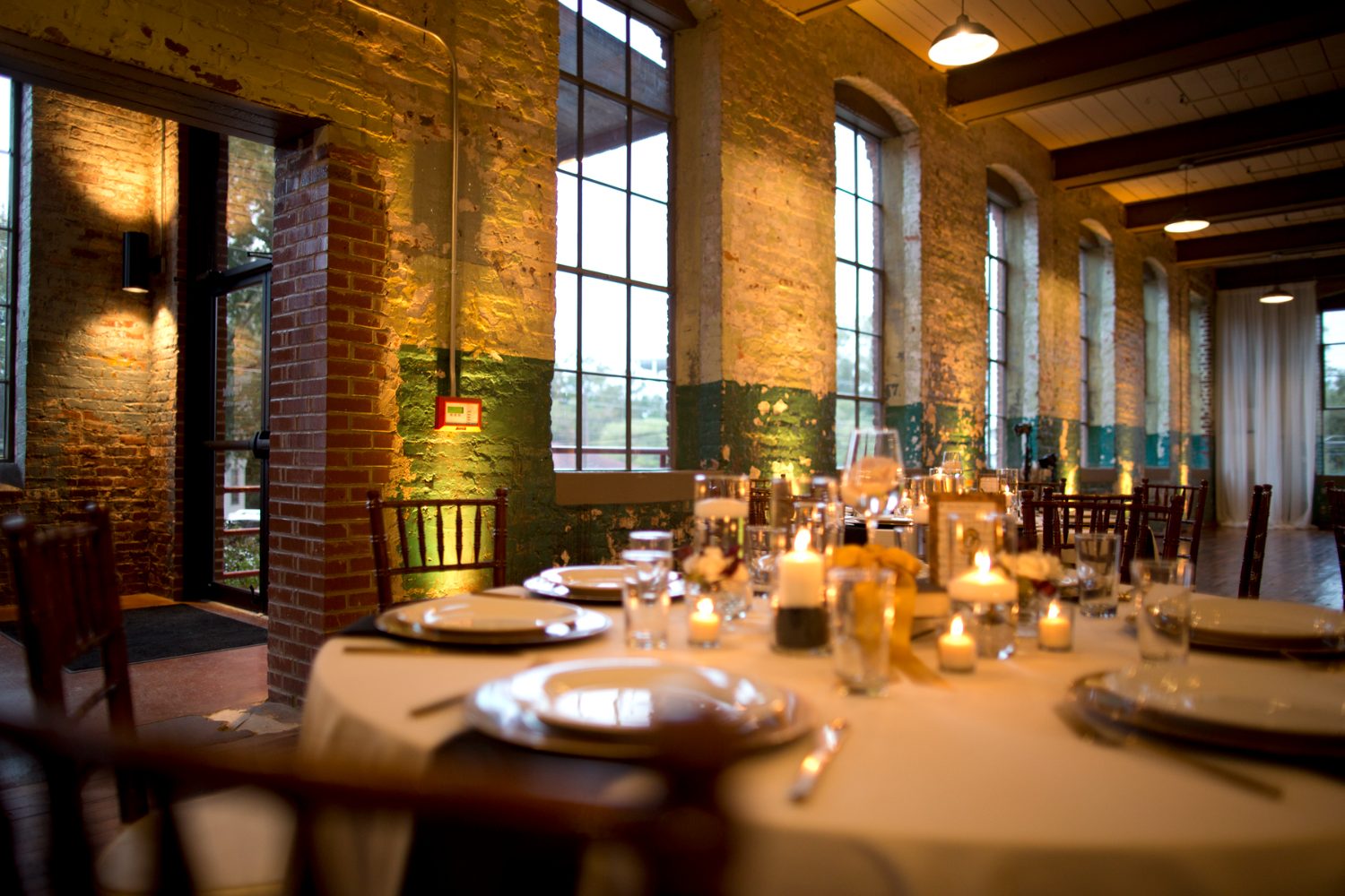 The same reception room washed in amber and green uplighting, Athens Georgia